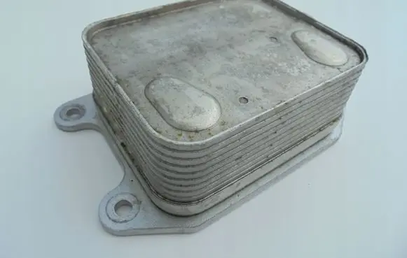 Skoda Octavia Mk3 (5E) Engine oil radiator 04E117021L