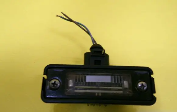 Volkswagen Golf IV Number plate light 1J6943021