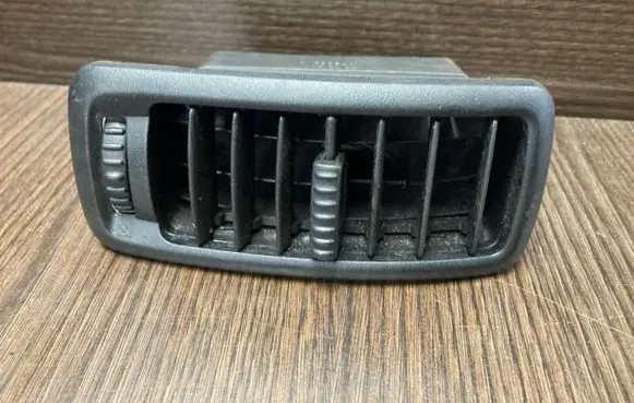Dash center air vent grill