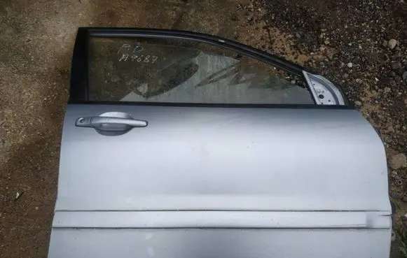 Mitsubishi Lancer Front door pilkos