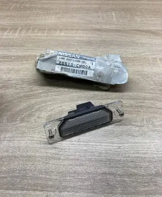 Nissan Maxima Number plate light 26510CM80A