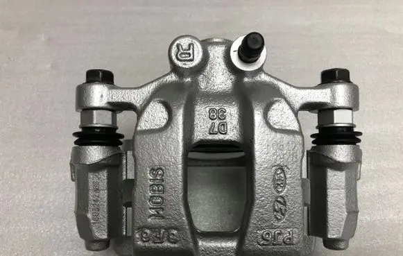 KIA Sportage Rear brake caliper 60581103Y000