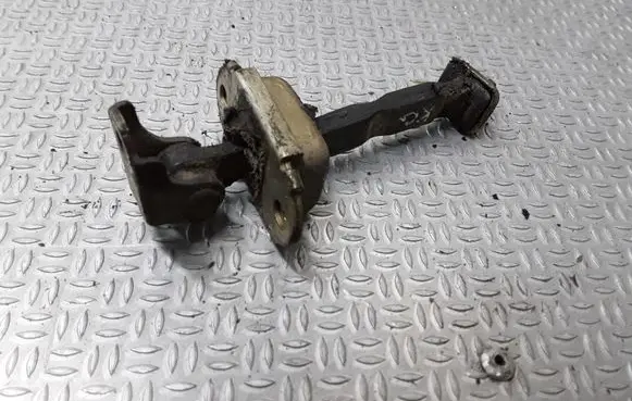 Nissan Primera Rear door check strap stopper