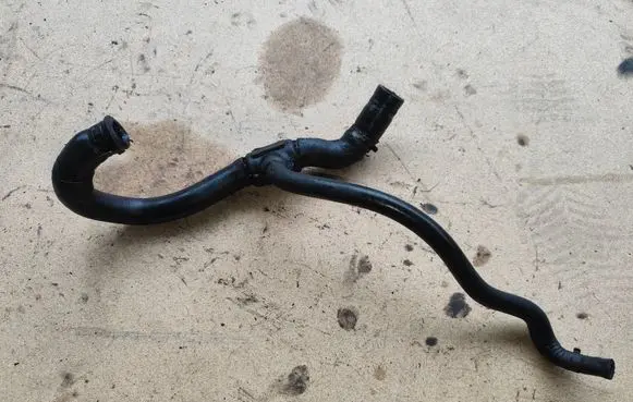 Opel Zafira A Engine coolant pipe/hose 24461675