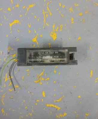Opel Corsa D Number plate light 0461200