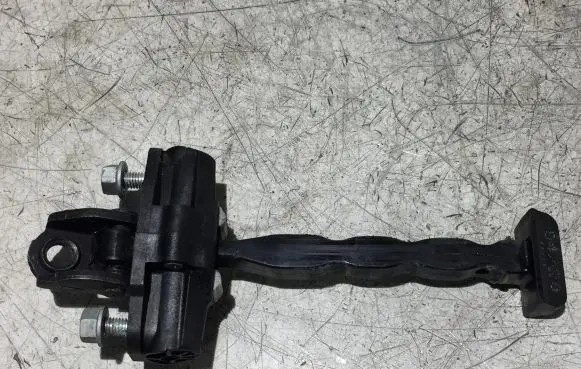 Ford Courier Front door check strap stopper
