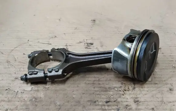 Piston with connecting rod