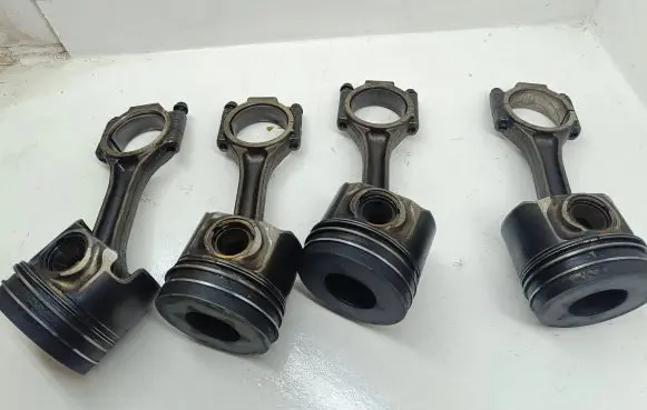 Piston with connecting rod