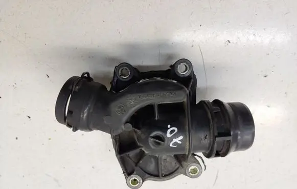 Thermostat/thermostat housing
