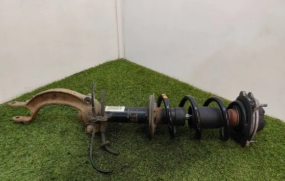 Front shock absorber with coil spring