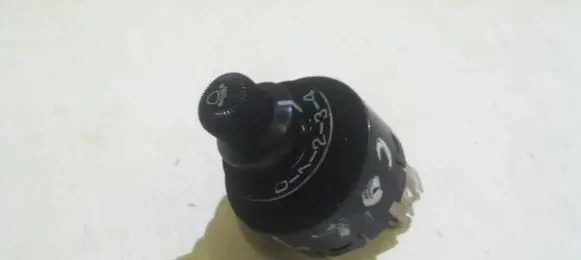 Mitsubishi Colt Headlight level height control switch