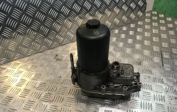 Jaguar XF Oil filter mounting bracket 4R8Q6C711DA