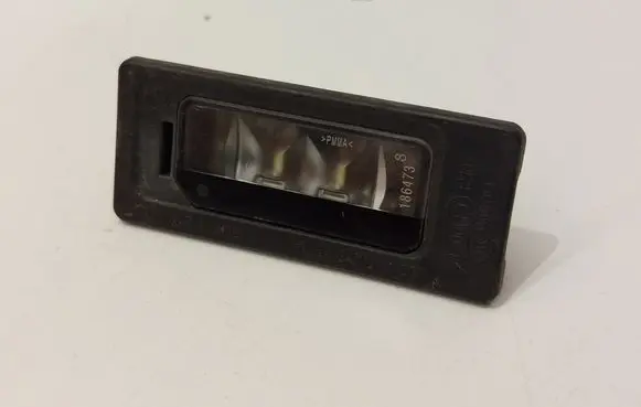 Volkswagen Jetta VI Number plate light 3AF943021A