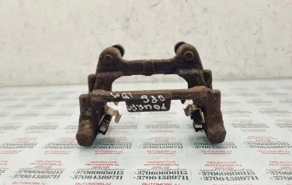 Volkswagen Touran II Brake caliper pad carrier rear 