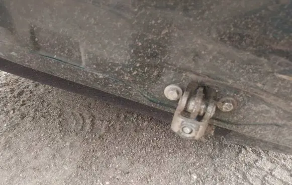 Rear door check strap stopper