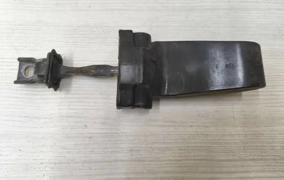 Rear door check strap stopper