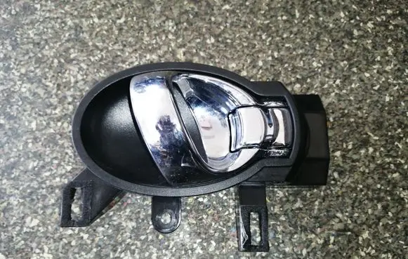 Nissan Juke I F15 Front door interior handle