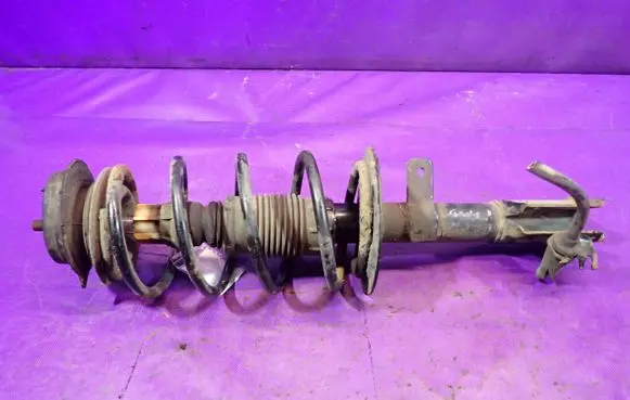 Front shock absorber with coil spring