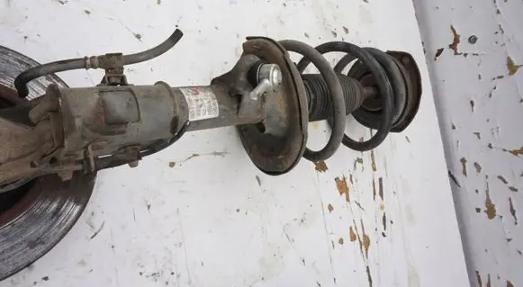 Hyundai H-1, Starex, Satellite Front shock absorber with coil spring