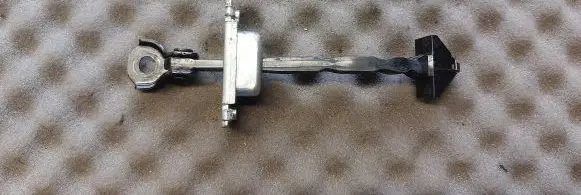 Rear door check strap stopper