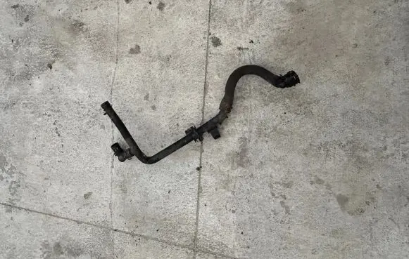 Skoda Superb B6 (3T) Engine coolant pipe/hose 03L121065AJ