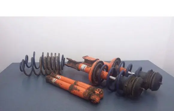 Opel Astra G Front shock absorber with coil spring 87501028R