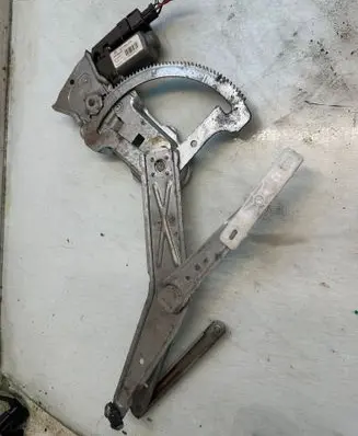 Opel Meriva A Front door window regulator with motor 13230562
