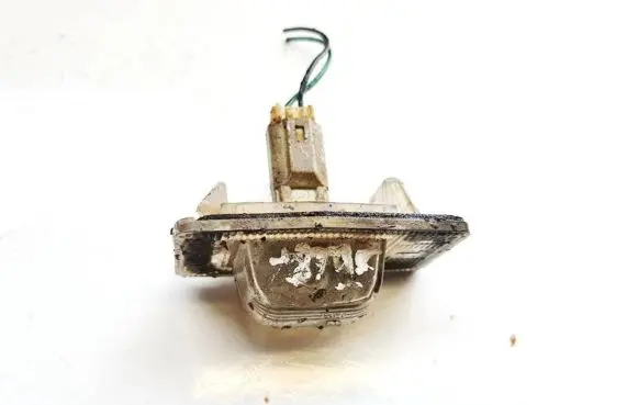 Mazda Premacy Number plate light E110384