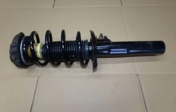 Volkswagen PASSAT B6 Front shock absorber with coil spring