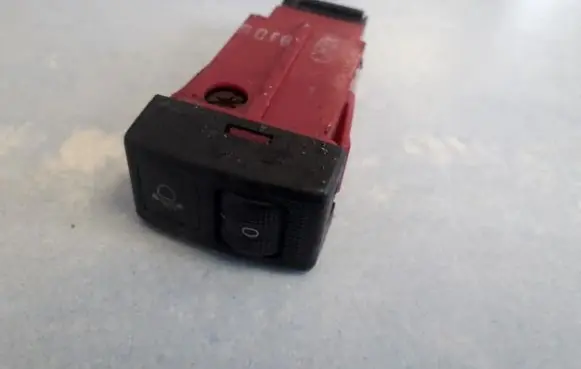 Headlight level height control switch