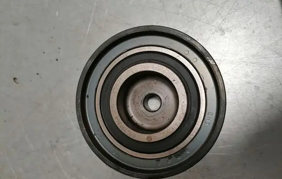 Timing belt tensioner pulley