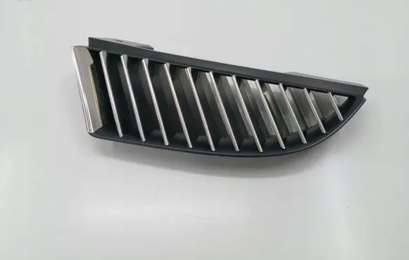 Mitsubishi Colt Front bumper upper radiator grill MN127773