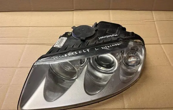 Volkswagen Touareg I Headlight/headlamp 7L6941015CE 89307871