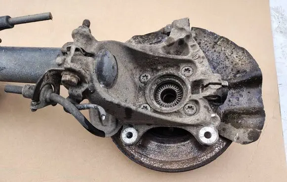 Front wheel hub spindle knuckle