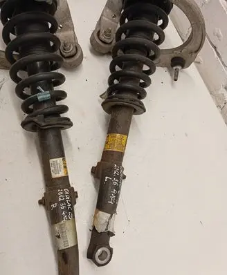 Front shock absorber with coil spring