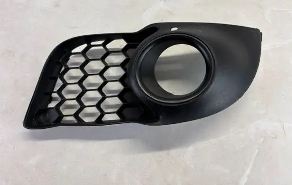 Mitsubishi Lancer X Front fog light trim/grill 8321a124 K3517