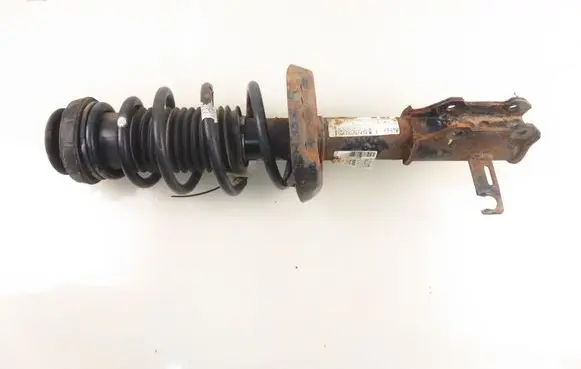 Opel Astra J Front shock absorber with coil spring 13412595