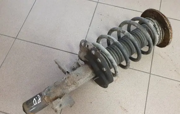Volvo V70 Front shock absorber with coil spring 31317795