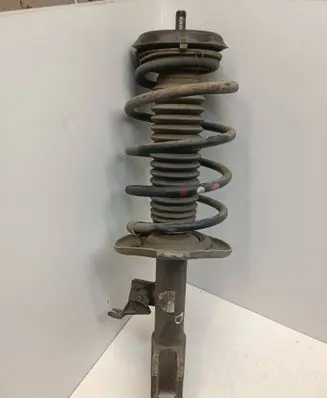 Front shock absorber with coil spring