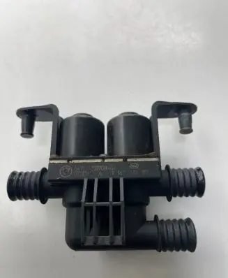 Coolant heater control valve