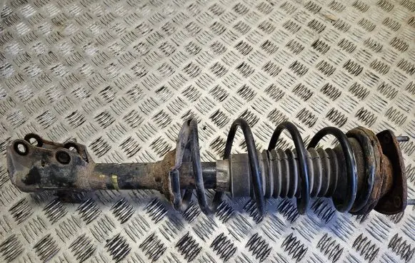 Toyota Yaris Front shock absorber with coil spring 485105240