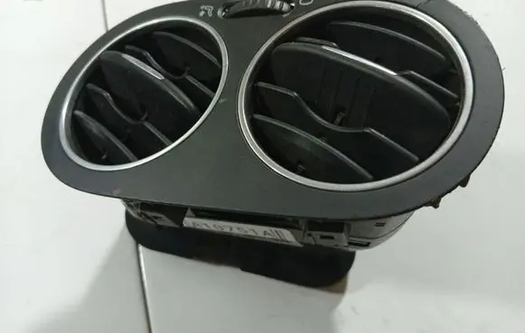Dash center air vent grill