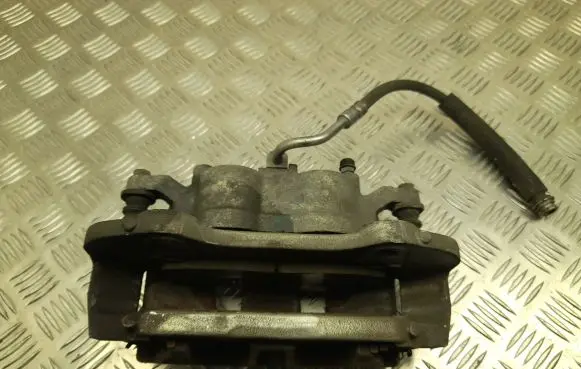 Dodge Grand Caravan Front brake caliper 17986801