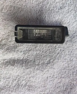 Volkswagen Polo V 6R Number plate light 1K8943021