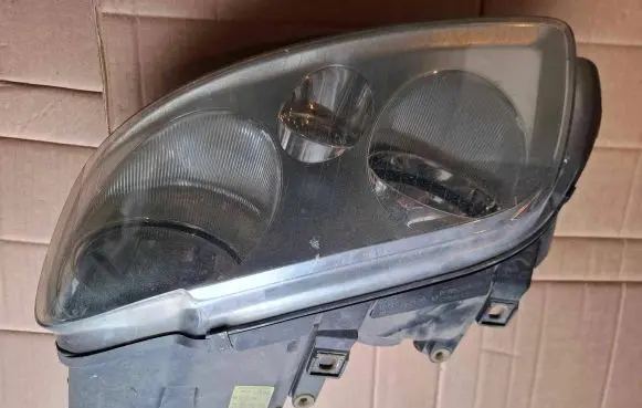Volkswagen Touran I Headlight/headlamp 2K0941005B 4VEX13006AF