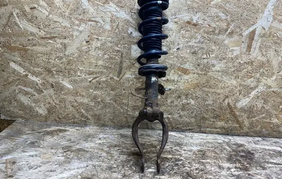 Front shock absorber with coil spring