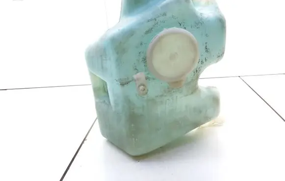 Opel Astra F Windshield washer fluid reservoir/tank 0023935