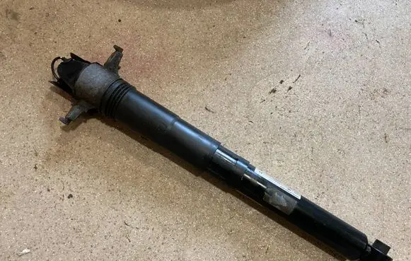 Porsche Cayenne (9Y0 9Y3) Rear shock absorber/damper 9Y0513031C