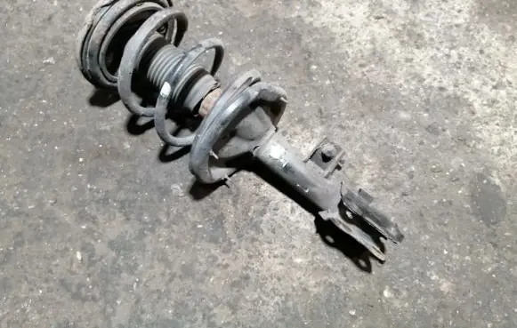 KIA Carens I Front shock absorber with coil spring