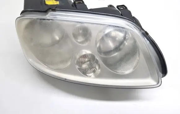 Volkswagen Touran I Headlight/headlamp 1T0941006D